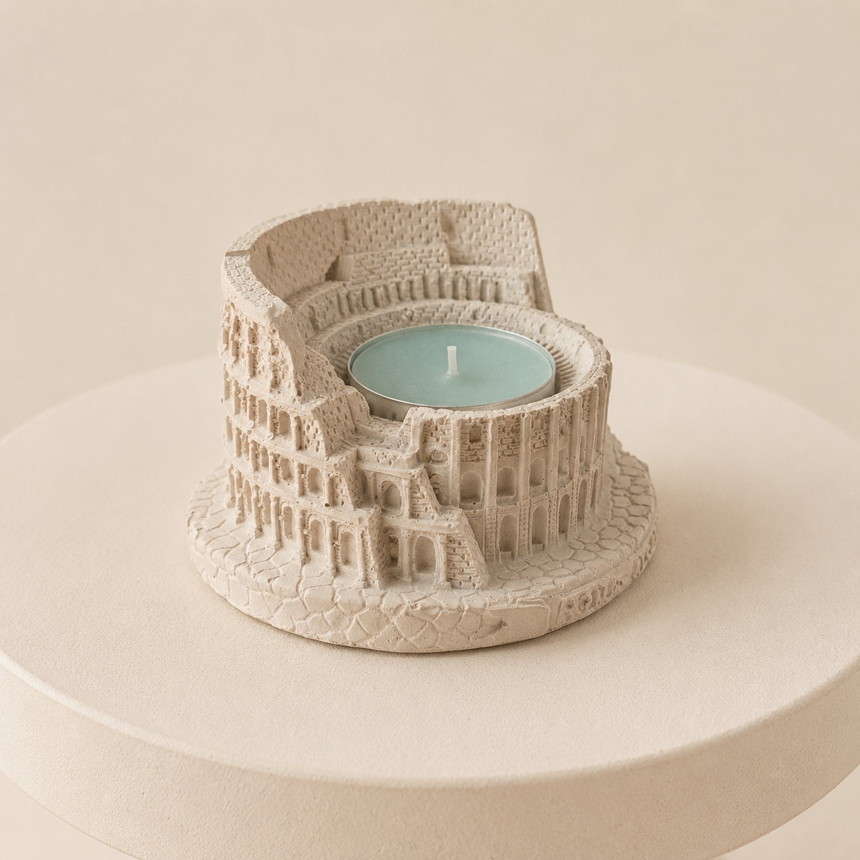Candle holder shaped like the Colosseum 